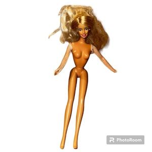Blonde Barbie doll in good condition just needs hair brushed